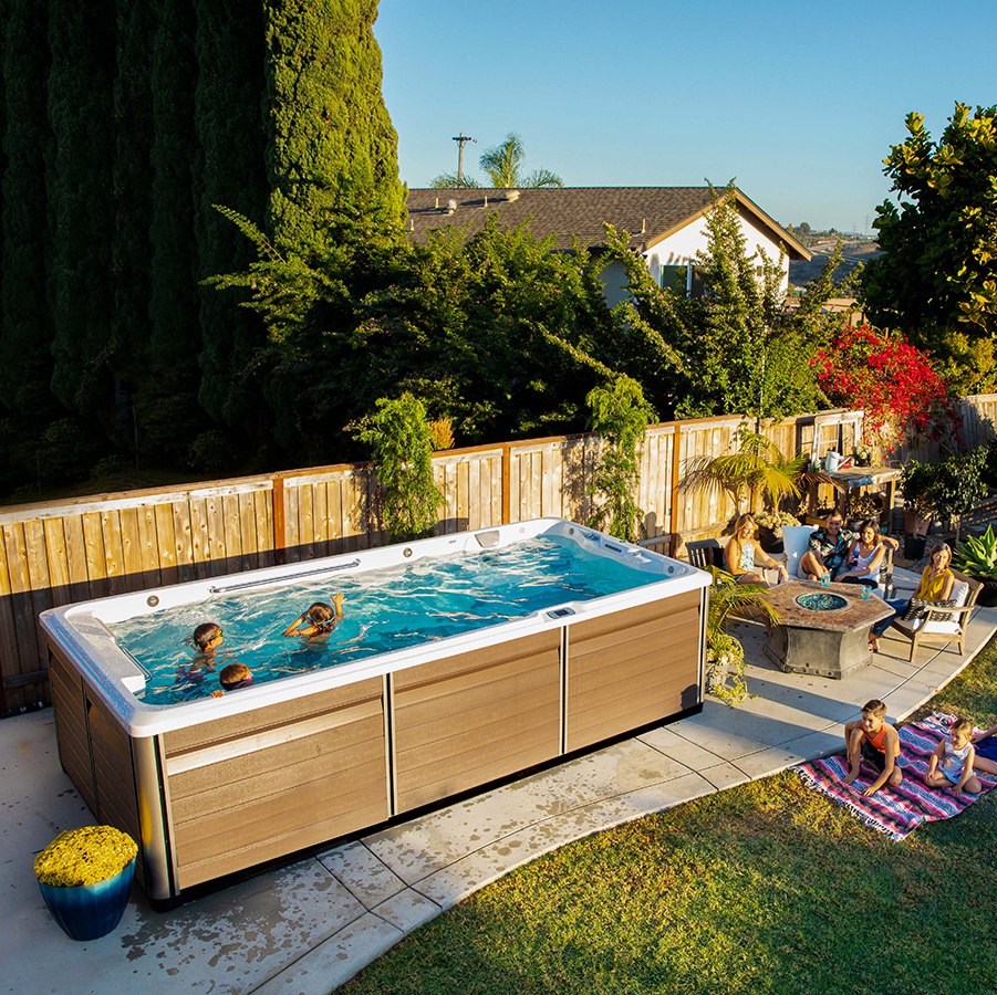 Family enjoying the R500 RecSport Swim Spa together