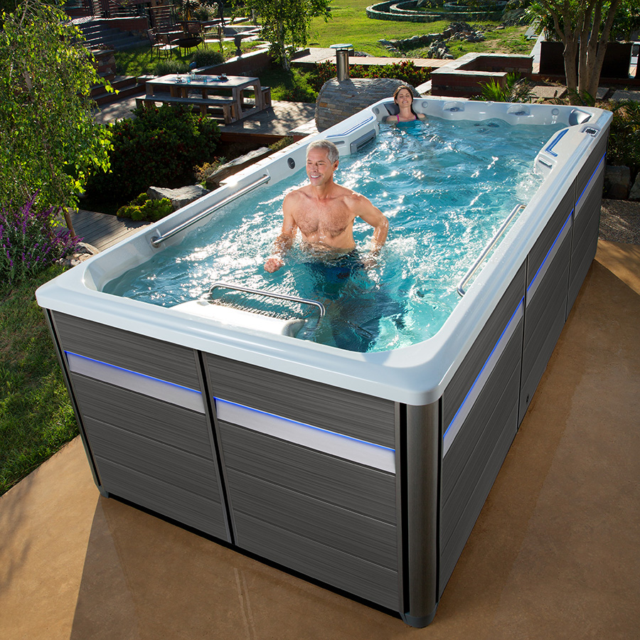 Man Running on treadmill Endless Pools E700 Swim Spa