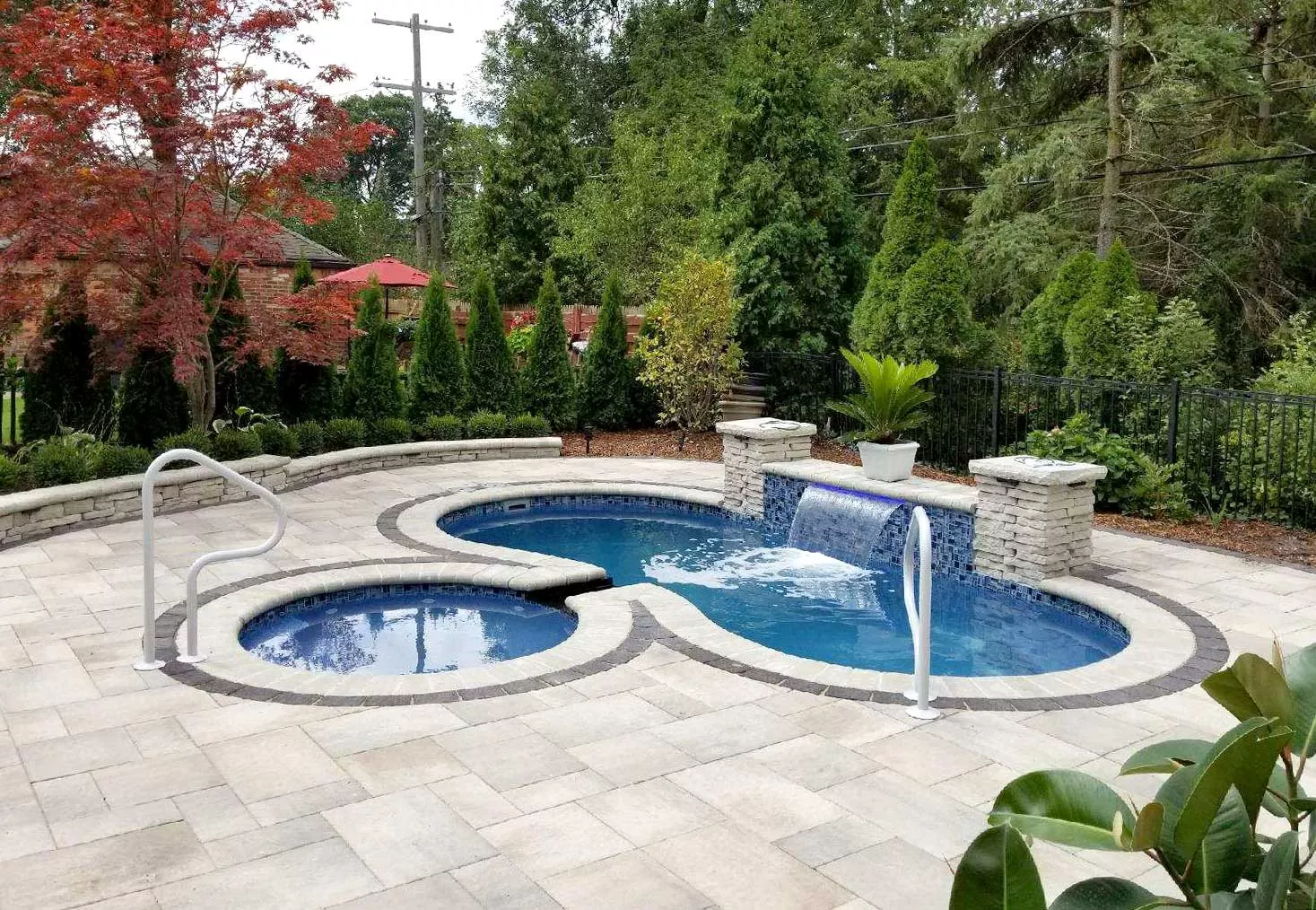 Freeform pool with landscaping