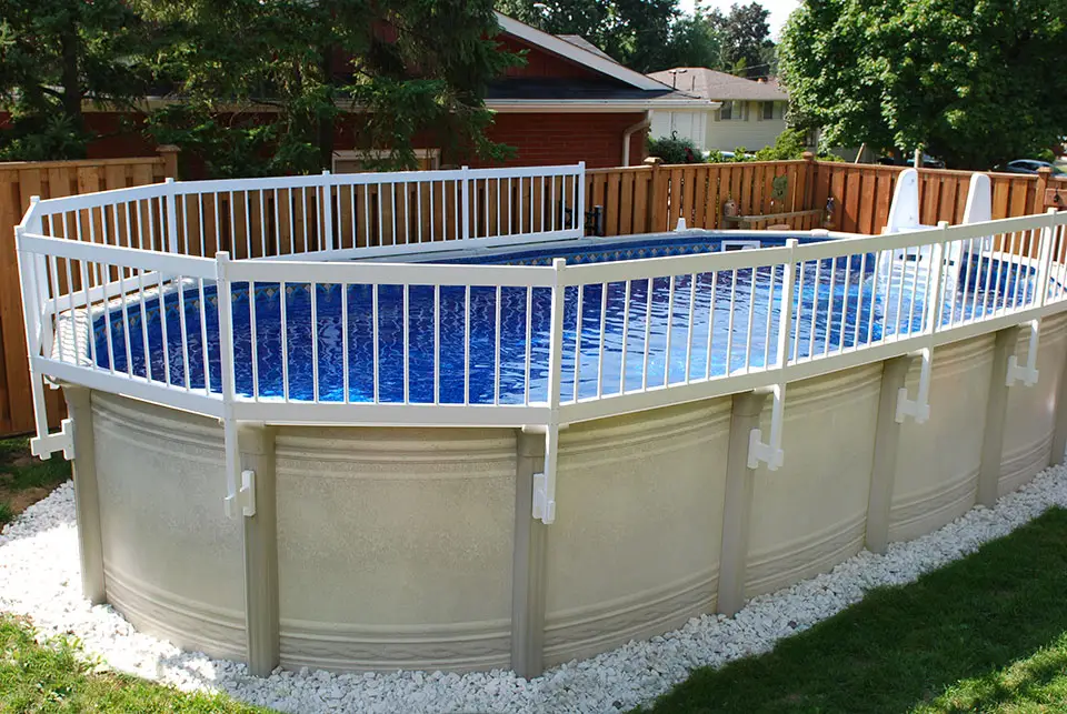 Pool with water feature at night