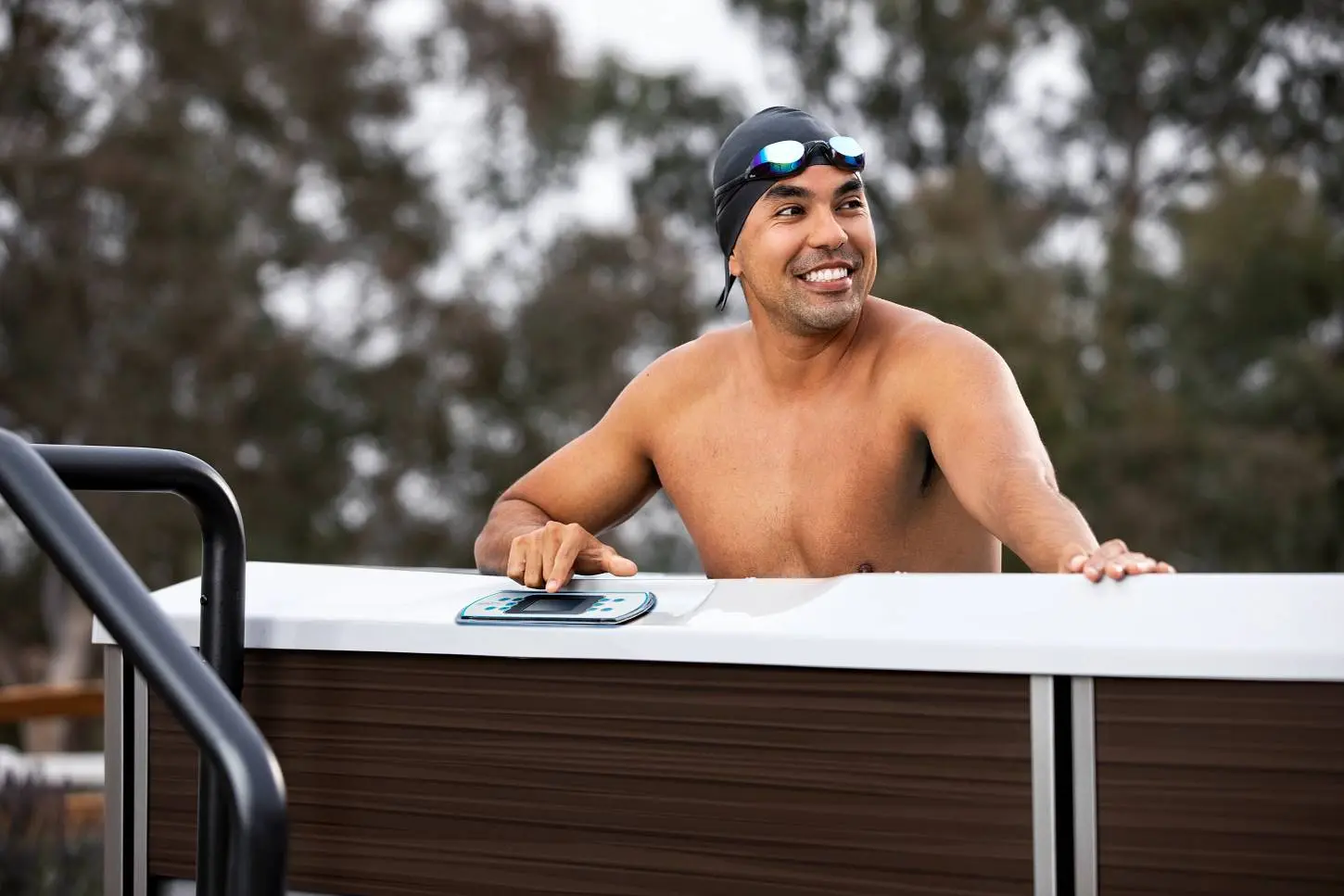 Swimmer using Endless Pools swim spa