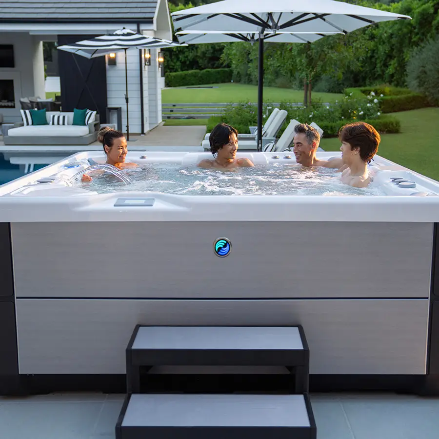 Family time in Grandee hot tub in baackyard