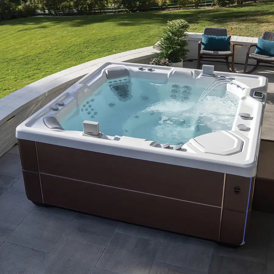 Image of HotSpring Vanguard Hot Tub in a backyard filled with water