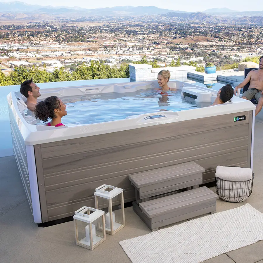View of two couples using HotSpring Limelight Prism