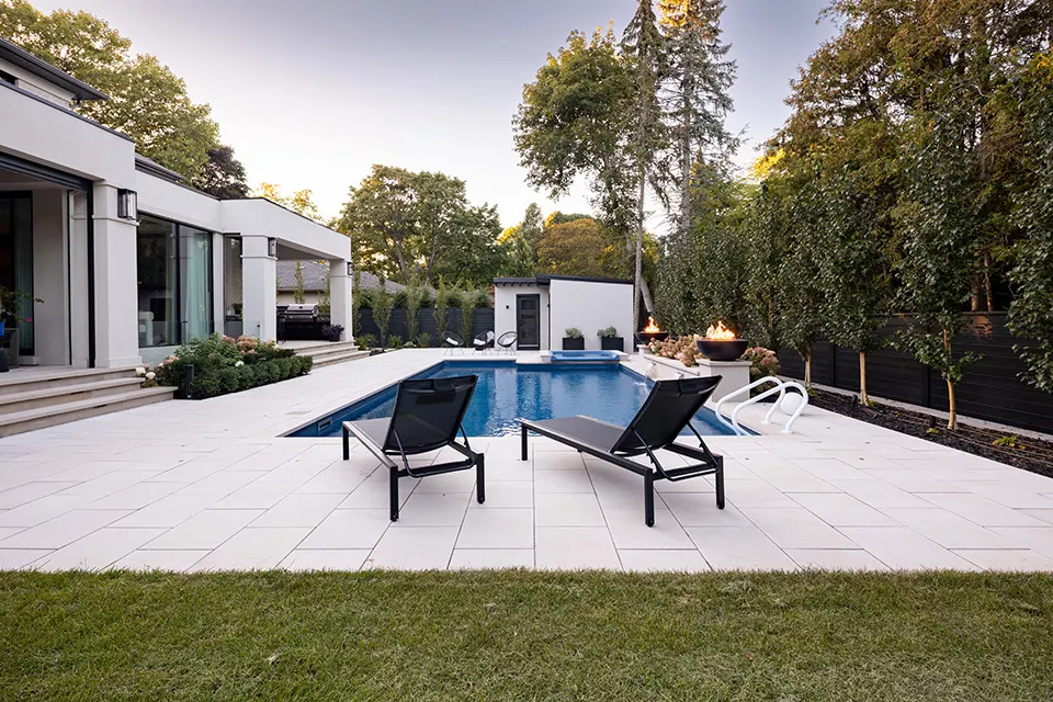 Large inground pool with stone surround