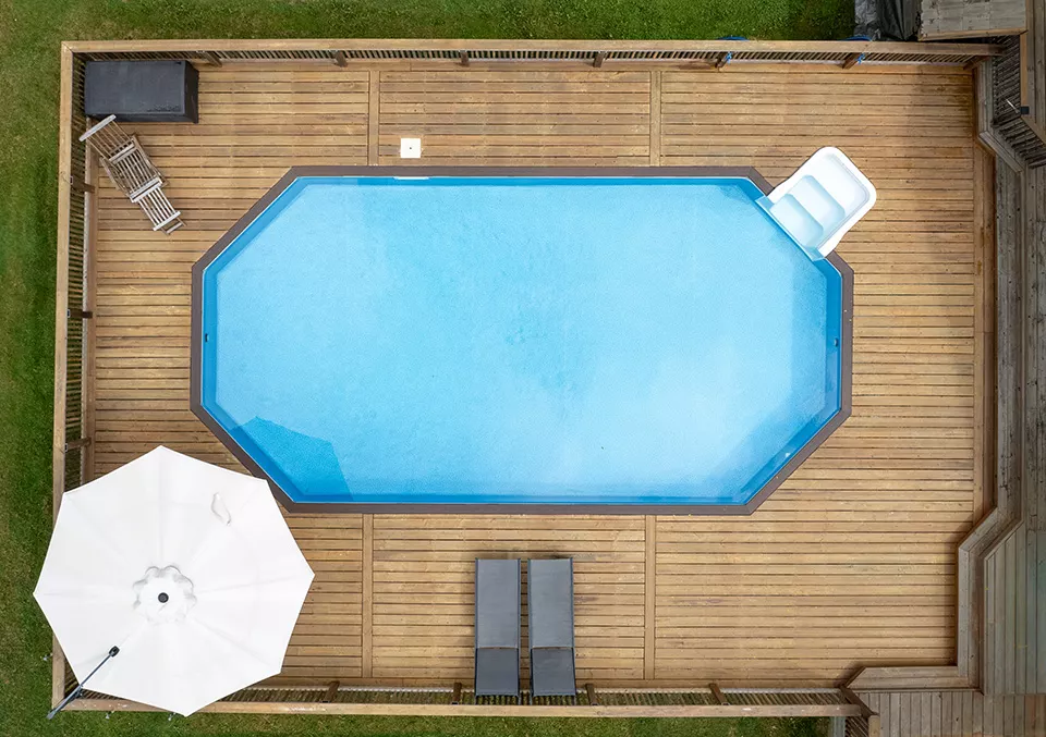 Pool with water feature at night