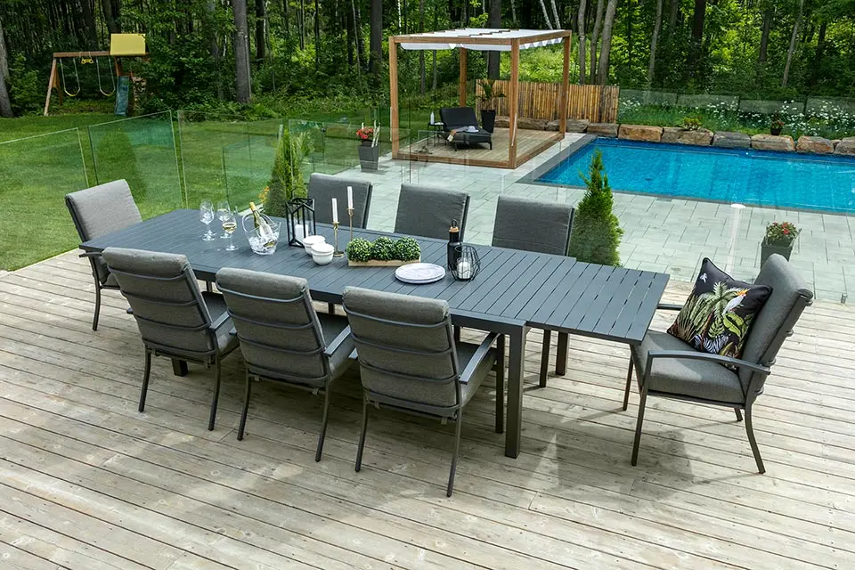 Outdoor dining table and chairs on a deck