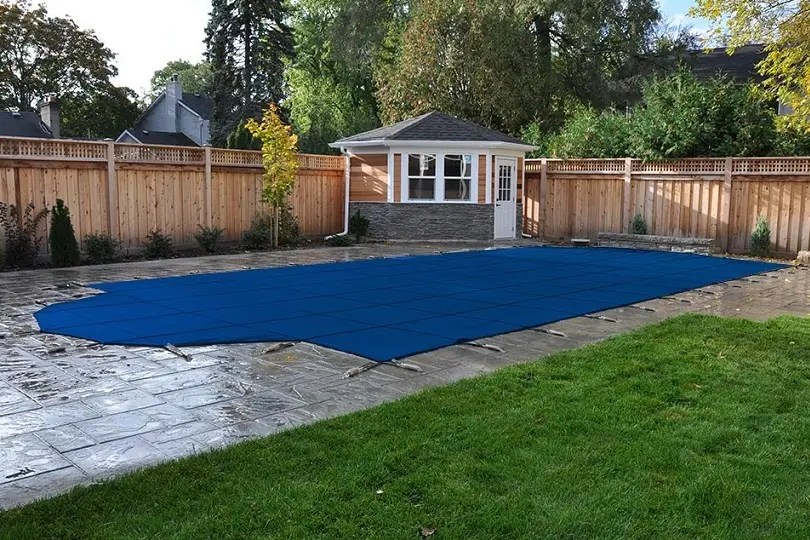 Large inground pool with stone surround