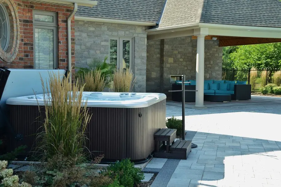 A technician servicing hot tub equipment