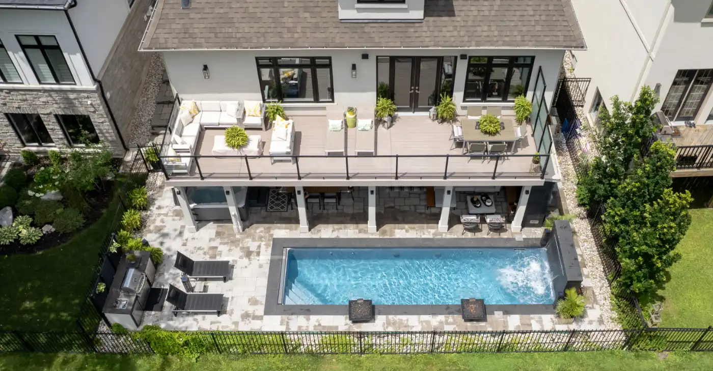 Backyard featuring swimming pool, hot tub, and patio furniture