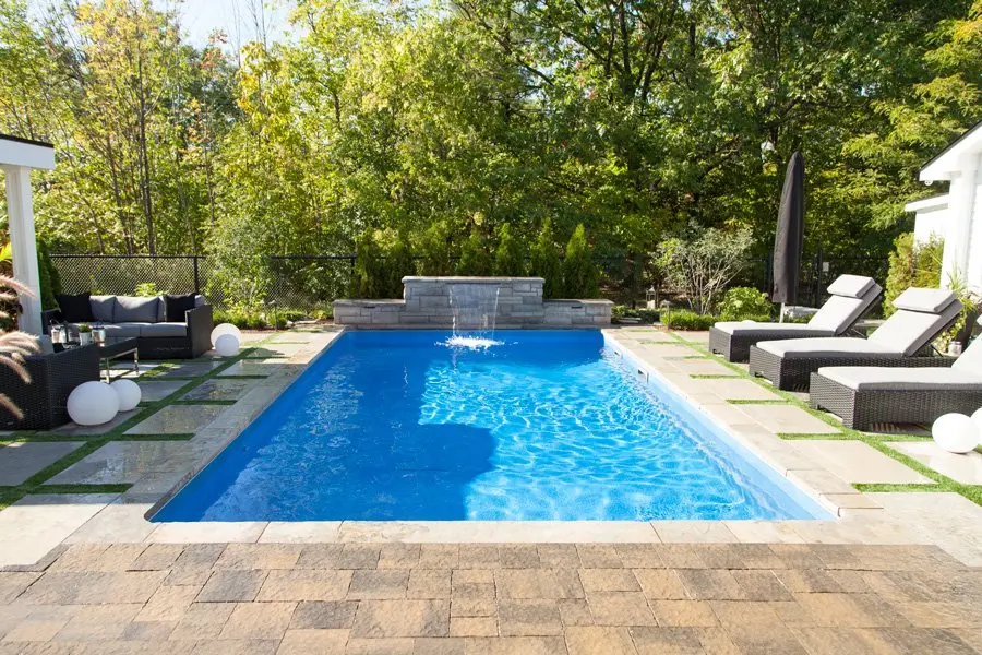 A clean, well-maintained backyard swimming pool