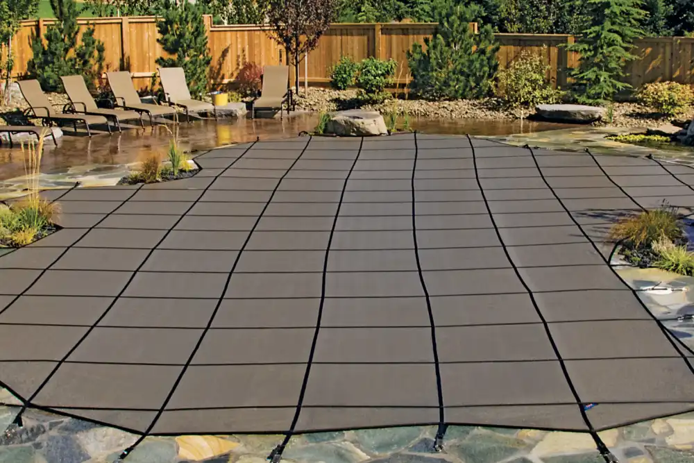 Inground Pool safety cover in small backyard